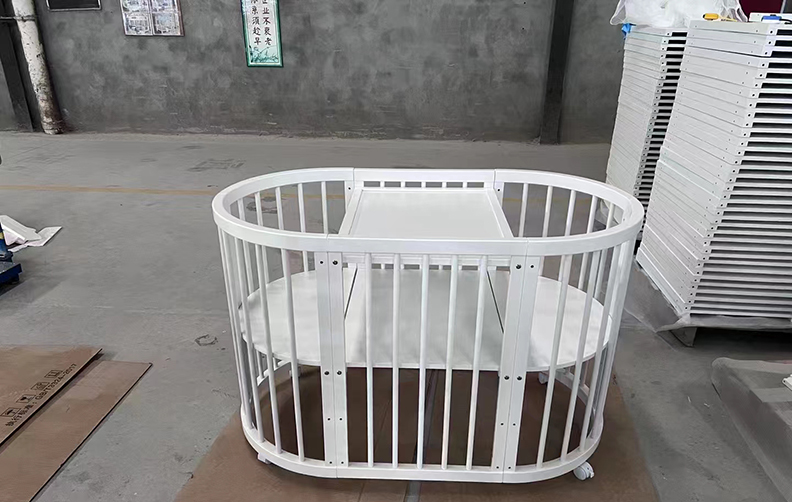 Oval baby bed
